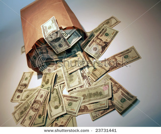 stock-photo-a-generic-brown-paper-bag-over-flowing-with-money-23731441.jpg