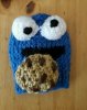 7091381-hand-knitted-gear-knob-beanie-hat-in-cookie-monster-design-0.jpeg