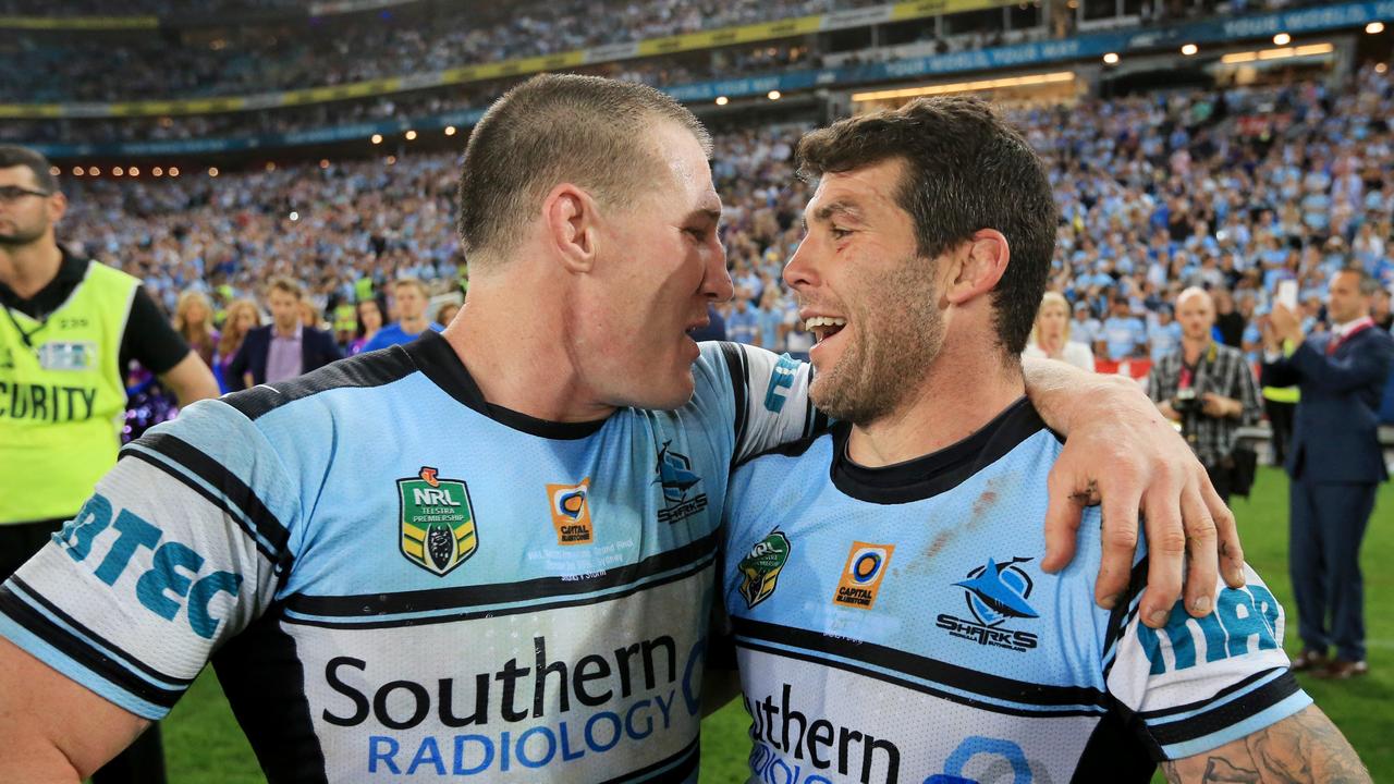Paul Gallen and Michael Ennis celebrate winning the 2016 NRL premiership in Michael Ennis’ final game. Image: Mark Evans