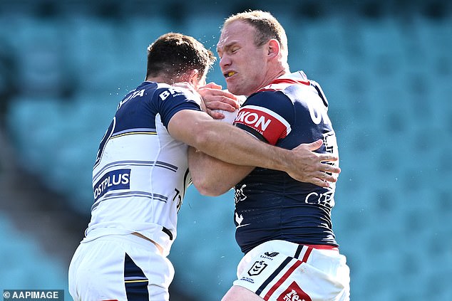 Lodge (right) is now at the Roosters, and thriving, after a stint with the Warriors since leaving Brisbane