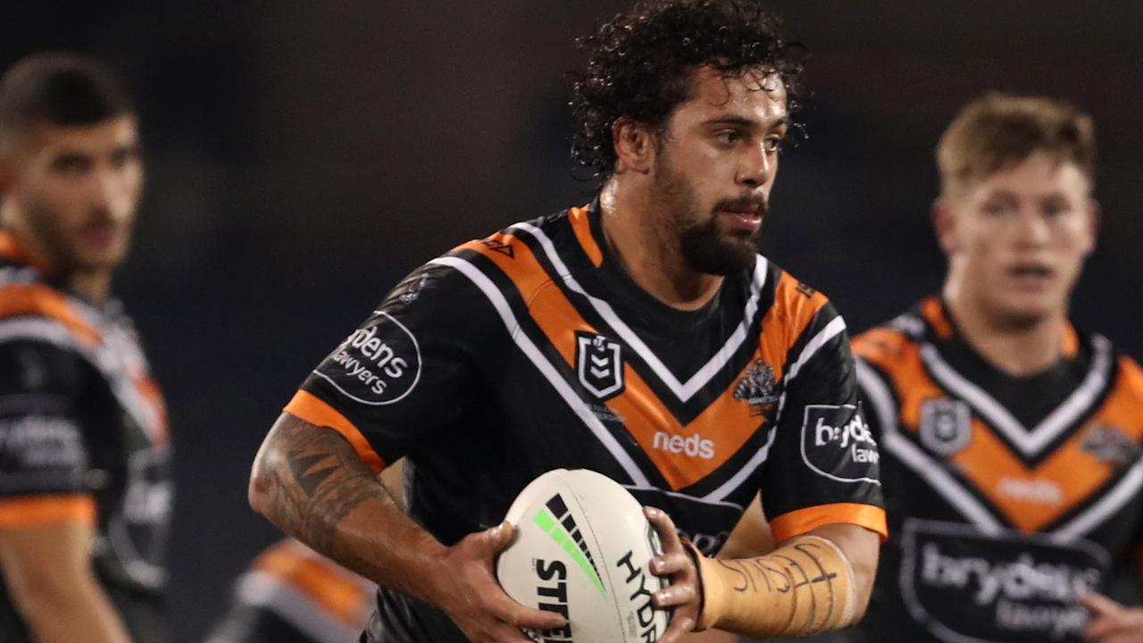 Josh Aloiai carts it up for the Tigers. (AAP Image/Brendon Thorne)